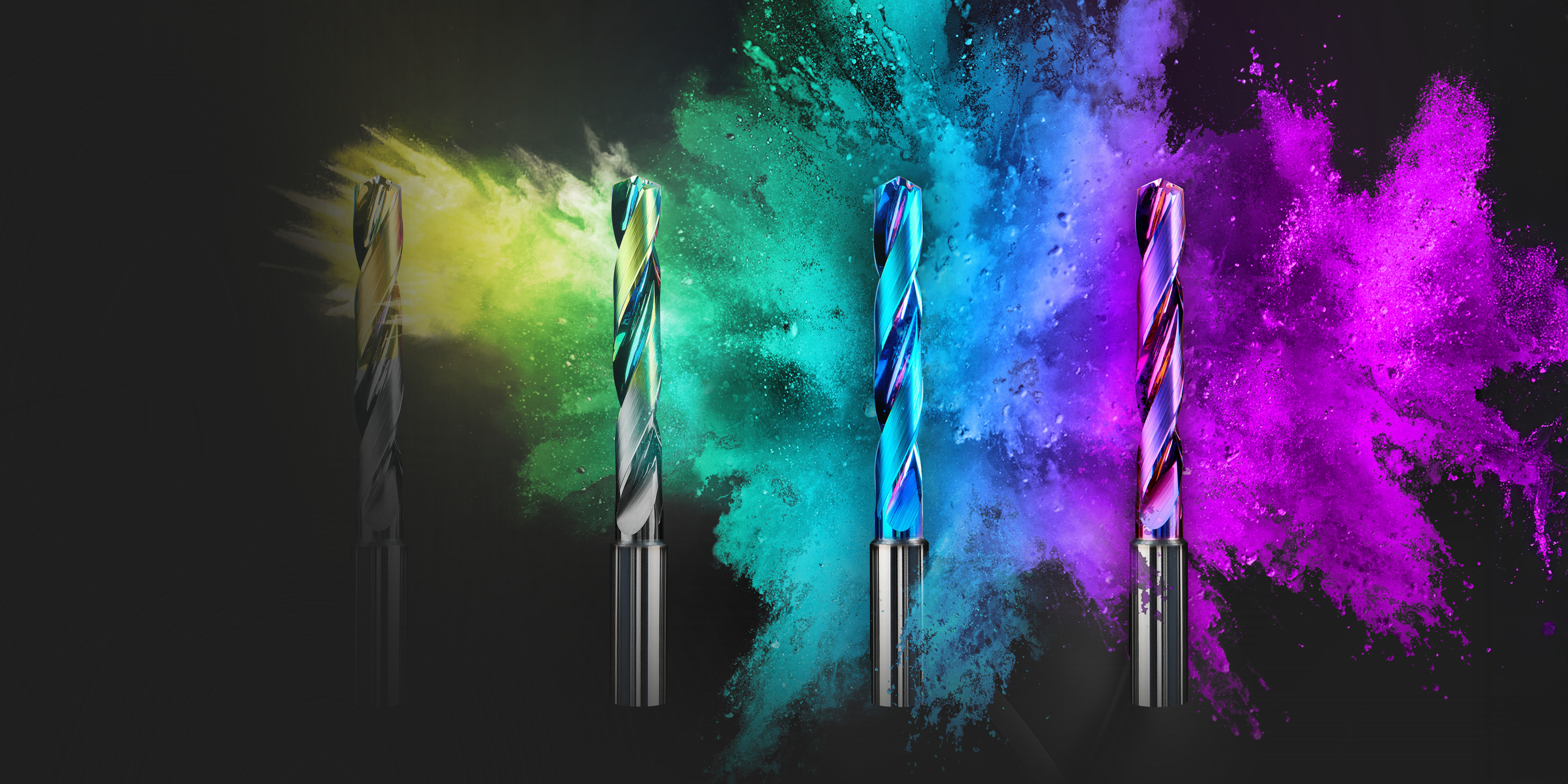 Verschiedene Bohrköpfe von Oerlikon Balzers vor einem bunt-explosiven Hintergrund